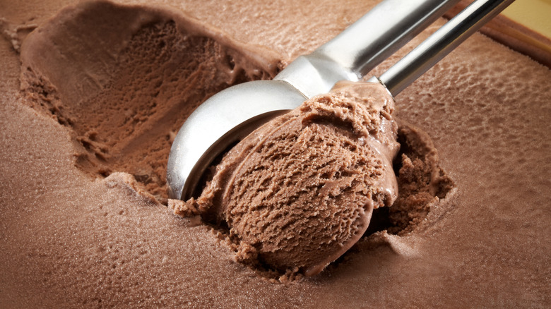 Scooping chocolate ice cream