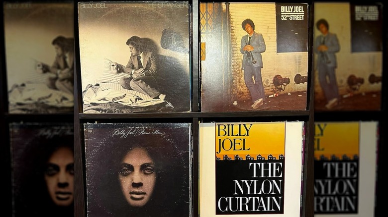 Spread of four Billy Joel records