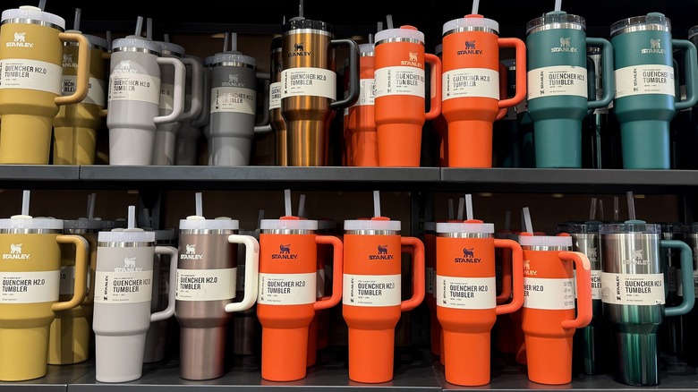 A variety of colorful Stanley tumblers on a store shelf