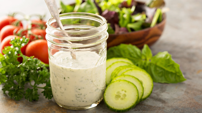 Jar of ranch dressing with vegetables