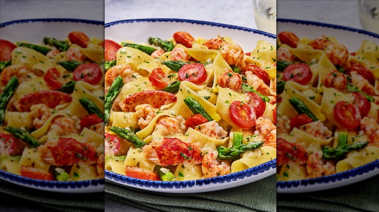 Lobster parpardelle on white and blue plate at Red Lobster