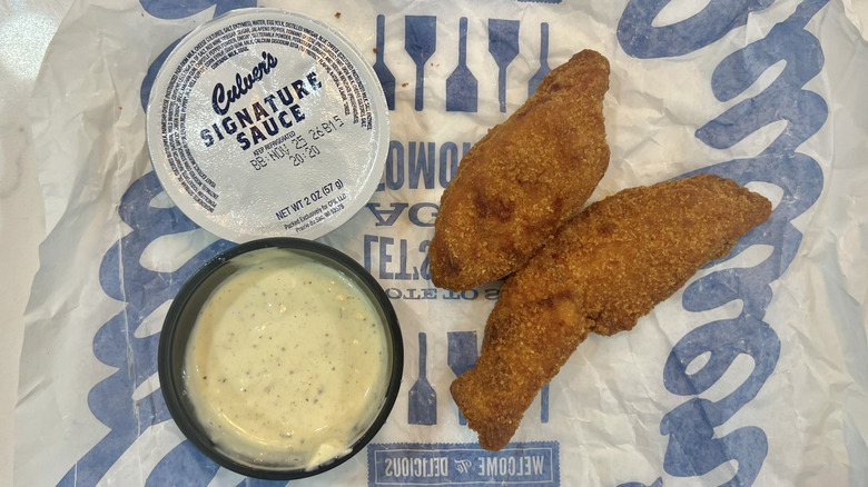 chicken tenders served with sauce