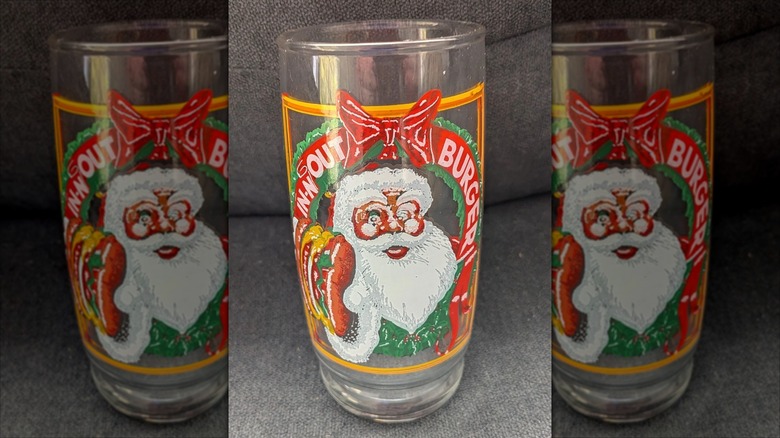 A vintage In-N-Out Burger Christmas Santa glass