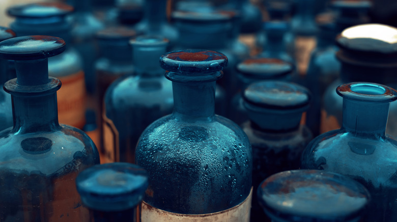 Tops of vintage blue bottles