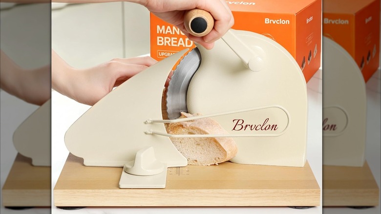 Product image of a cream-colored manual bread slicer