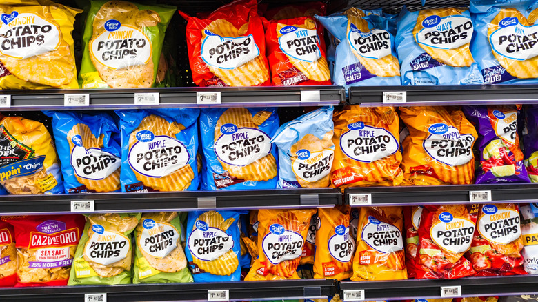 Assortment of Great Value potato chips on Walmart store shelf
