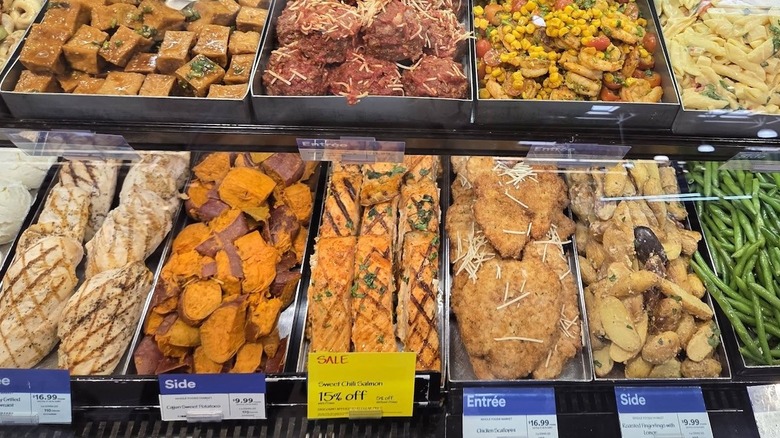 Premade meals at the counter at Whole Foods