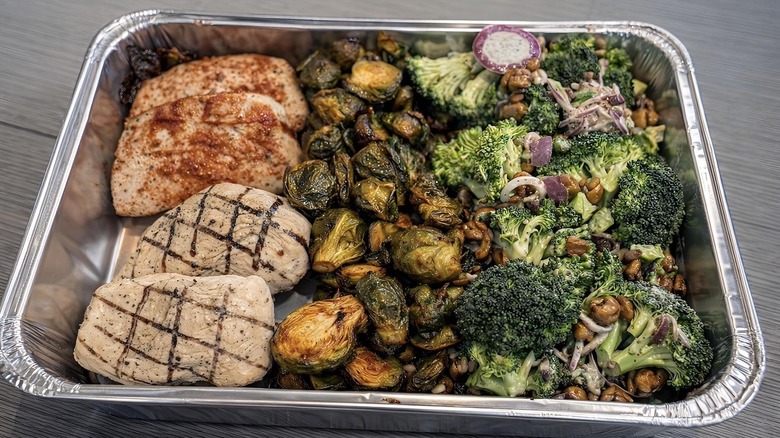 a tray of chicken and veggies from Whole Foods