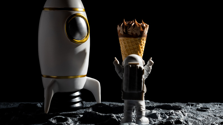 Astronaut with ice cream on moon
