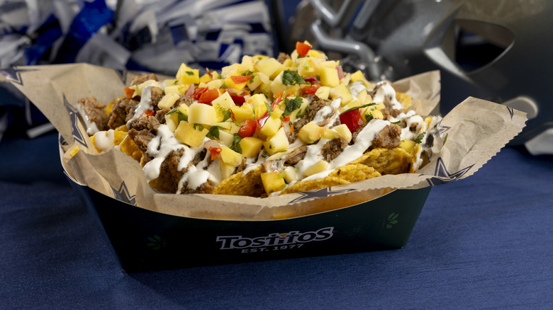 A product image of the Tostitos Island jerk nachos at the AT&T Stadium