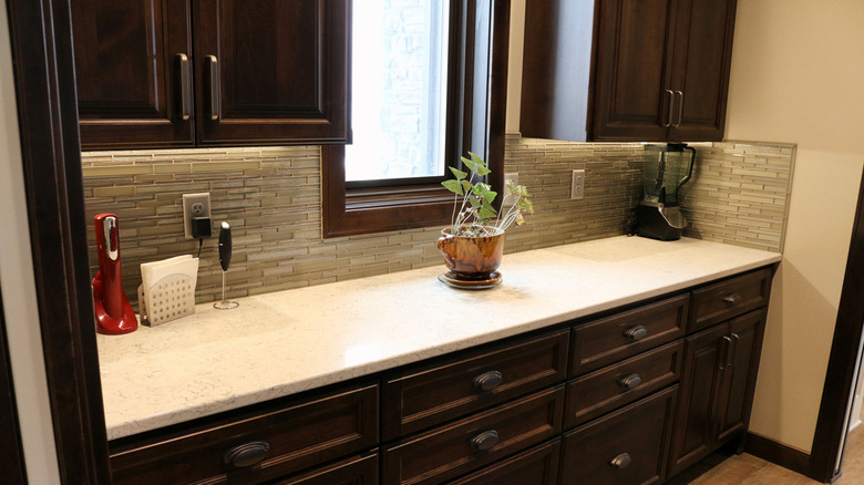 Home interior with dark wood cabinetry