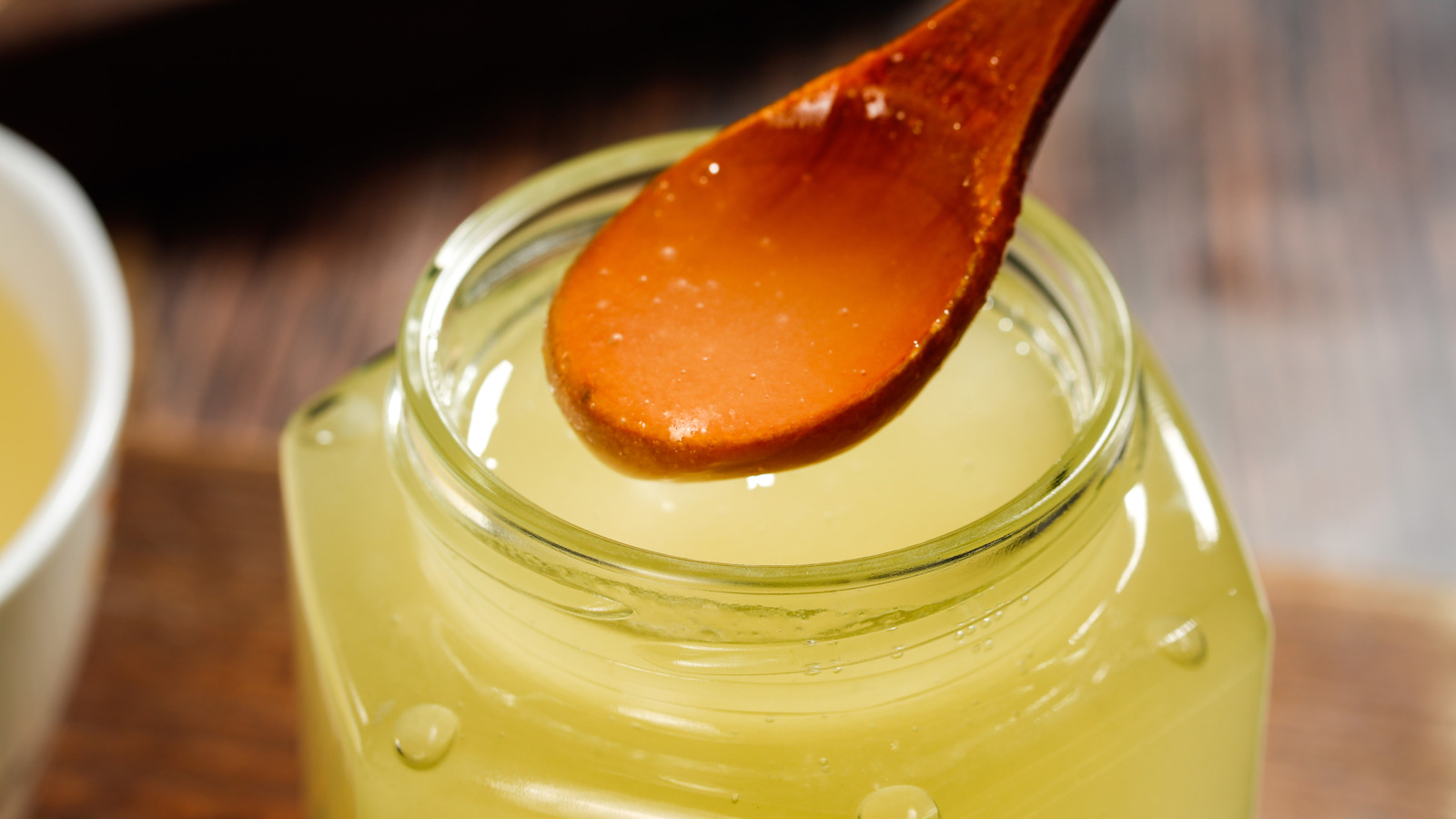 The Wooden Spoon Myth You Shouldn't Believe When It Comes To Honey - Tasting Table