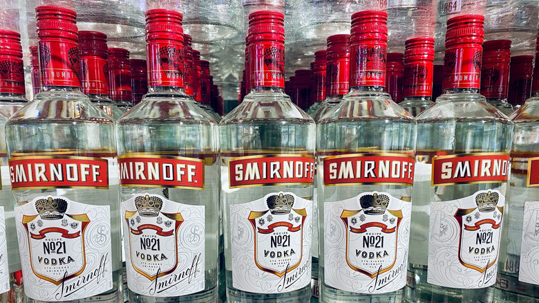 rows and rows of Smirnoff No. 21 vodka in bottles