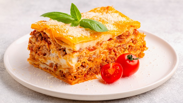 slice of lasagna on white plate