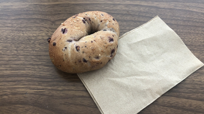 blueberry bagel on napkin