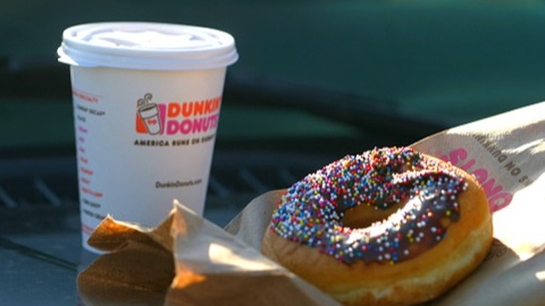 Dunkin coffee and sprinkle donut