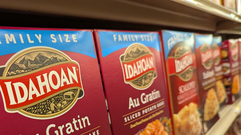 Idahoan scalloped potato boxes on shelves