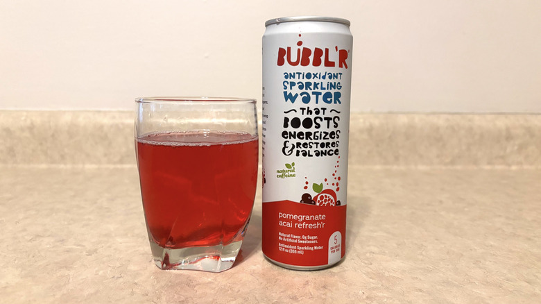 Glass and can of Bubbl'r Pomegranate Antioxidant Sparkling Water