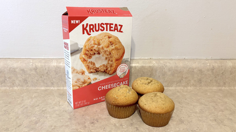 Krustaez cheescake muffins and box on a counter