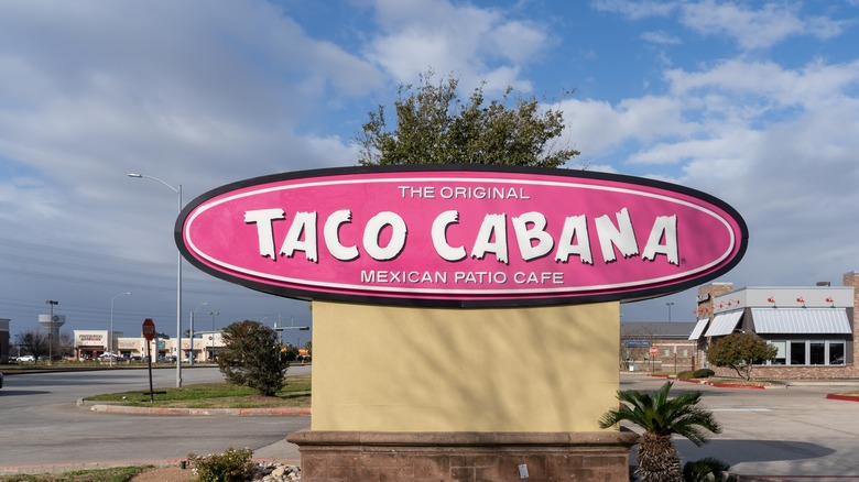 Taco Cabana sign with sky in background