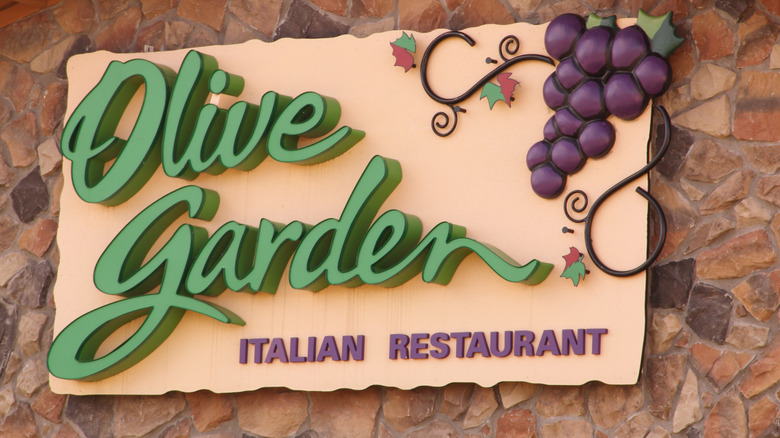 A closeup view of Olive Garden sign.