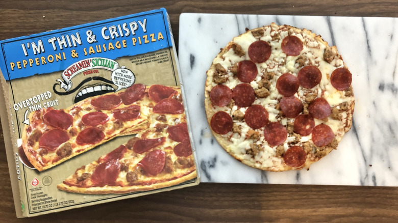 Screamin' Sicilian's Pepperoni & Sausage pizza and its box beside it