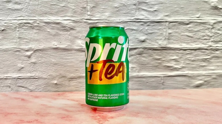 Sprite + Tea can on table