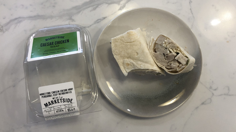 walmart's marketside caesar chicken wrap on plate with container