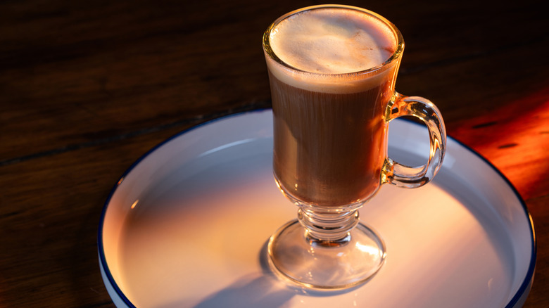an irish coffee cocktail on a white tray