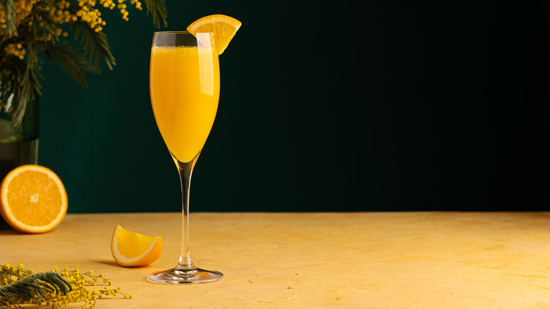 mimosa cocktail on a wooden table