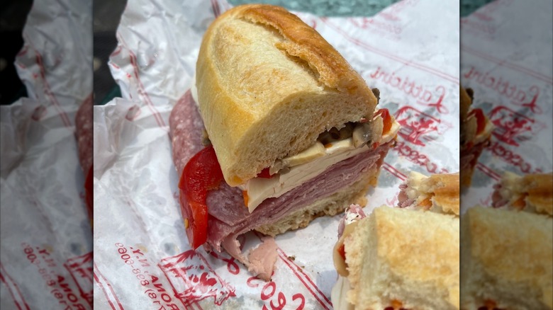 Piece of the Mama's Special sub on a Leo's Latticini wrapper