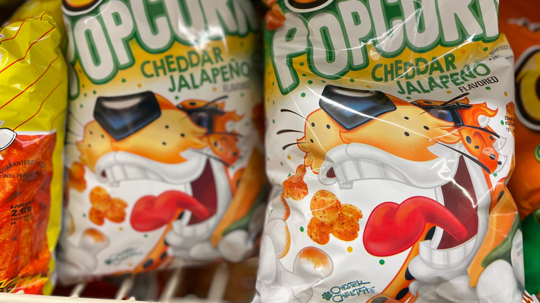 Bags of Cheetos popcorn with Chester Cheetah