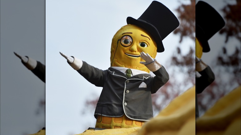 Planters' Mr Peanut mascot dancing on a float