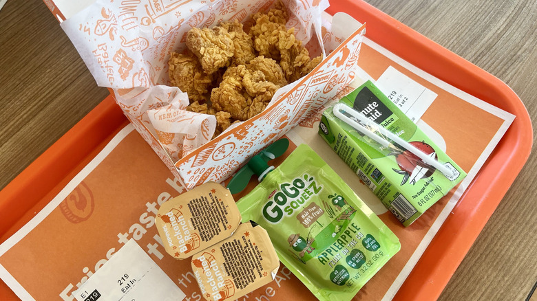 Popeye's four-piece chicken meal with sauces