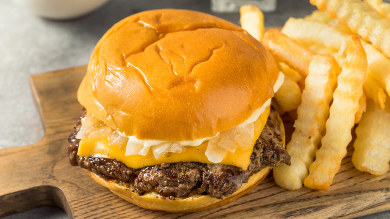 burger on board with fries