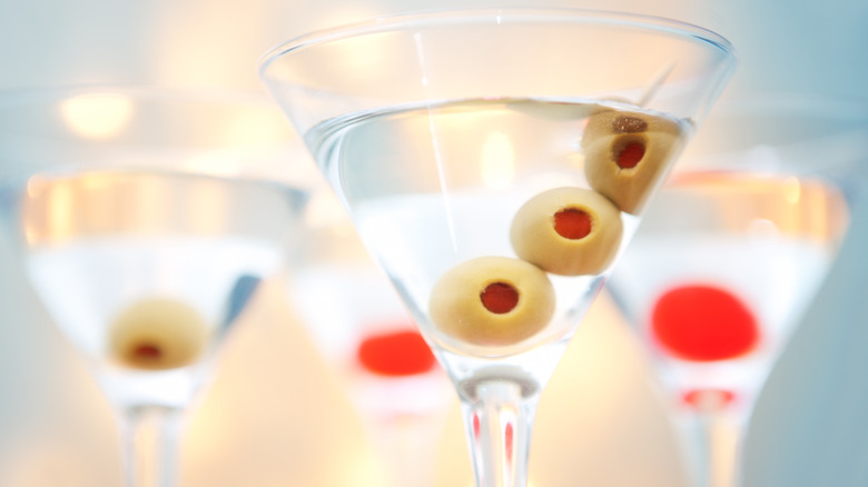 Close up of martinis with olives 