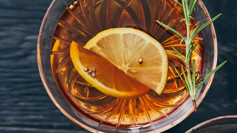 bourbon cocktail with rosemary and lemon