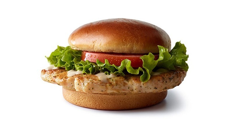 McDonald's Artisan Grilled Chicken Sandwich with lettuce and tomato on white background