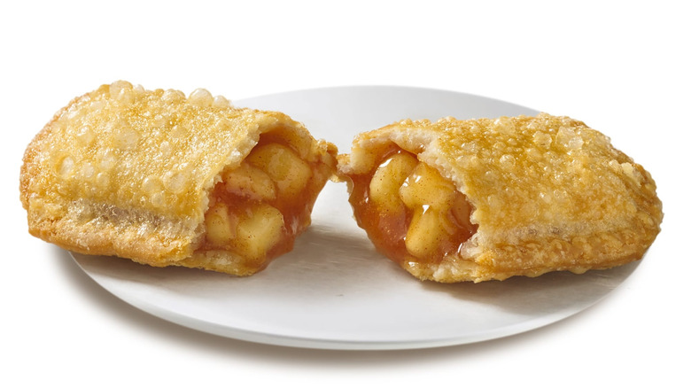 Delicious fried apple pie, pie with apple filling isolated on white background