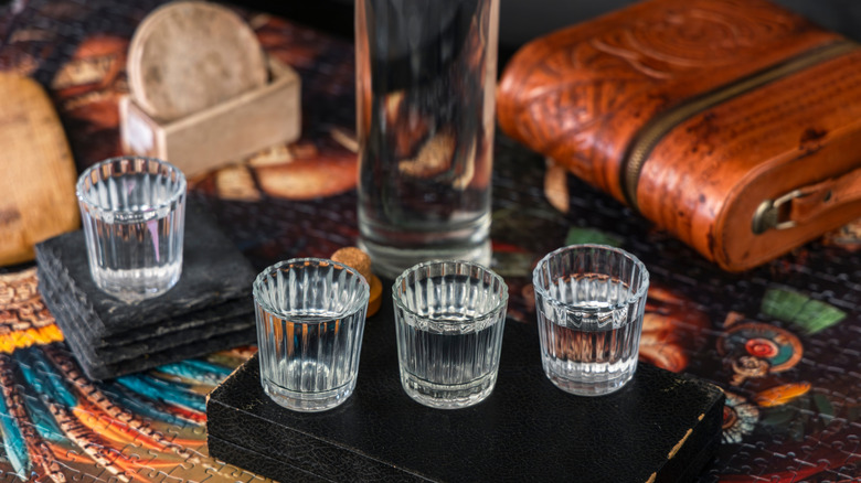 Bottle clear shots of mezcal