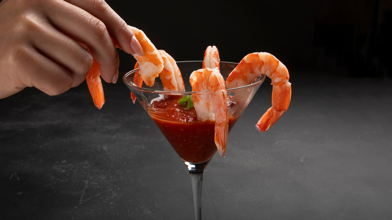 Shrimp cocktail served in martini glass