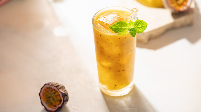 Passionfruit spritz with mint garnish