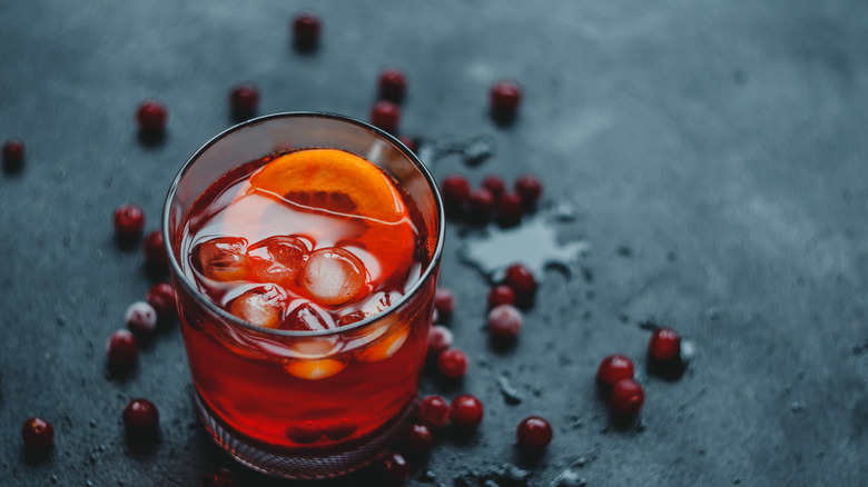 Cranberry spritz with cranberries on table