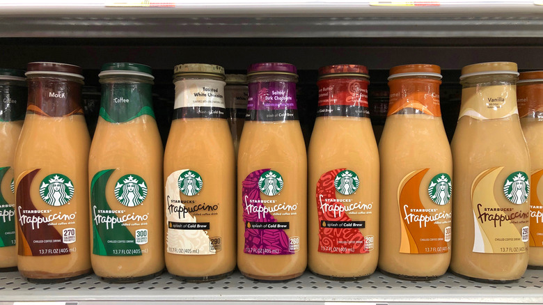 A variety of Starbucks bottled Frappuccinos on a store shelf
