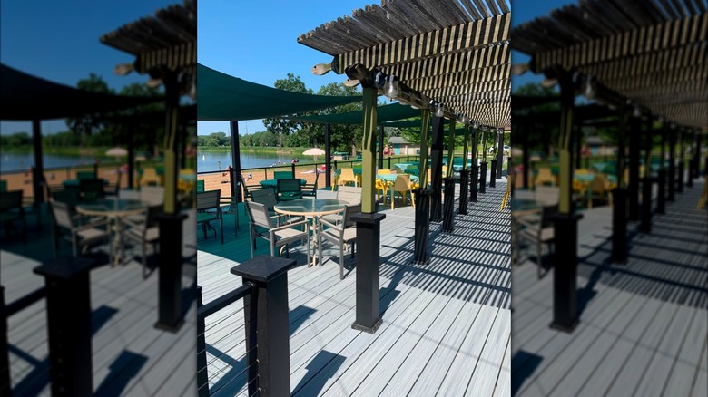 Lakeside patio seating at Fisher's Club