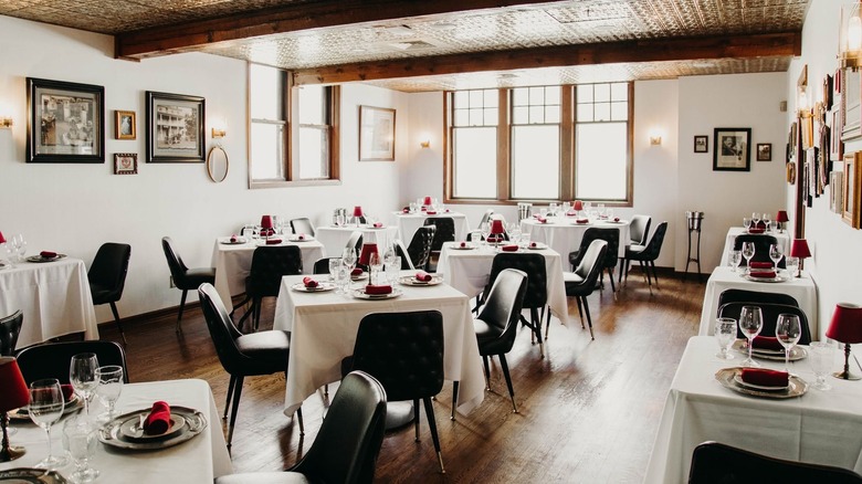 Red Circle Inn's dining room with tables set and ready for service