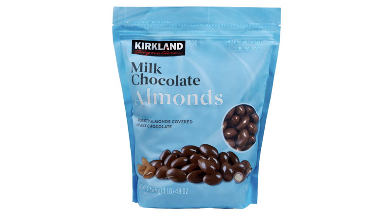 A product shot of a bag of Kirkland Signature Milk Chocolate Almonds.