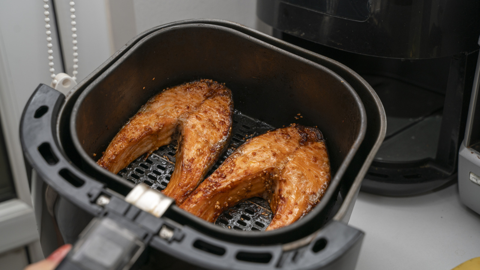 These 2 Simple Ingredients Are Everything Your Air-Fried Salmon Needs To Shine