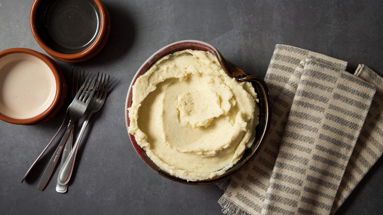 mashed potatoes served on table