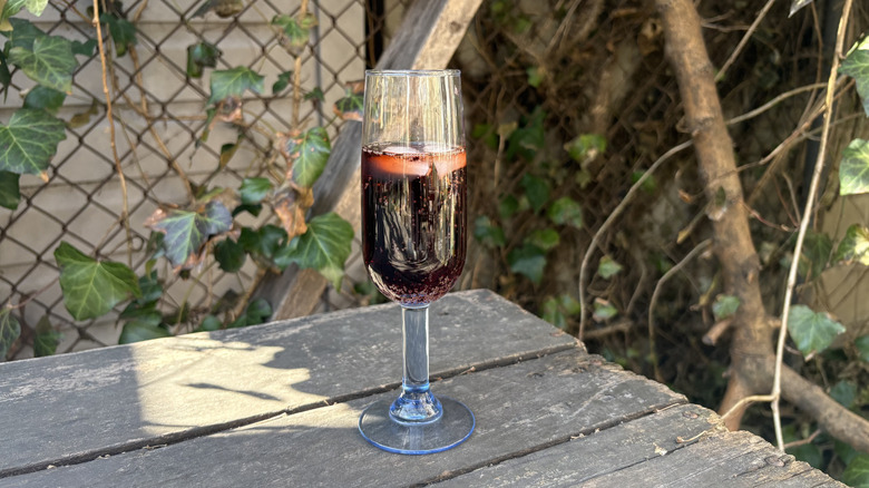 Cherry vanilla Coca-Cola in champagne flute